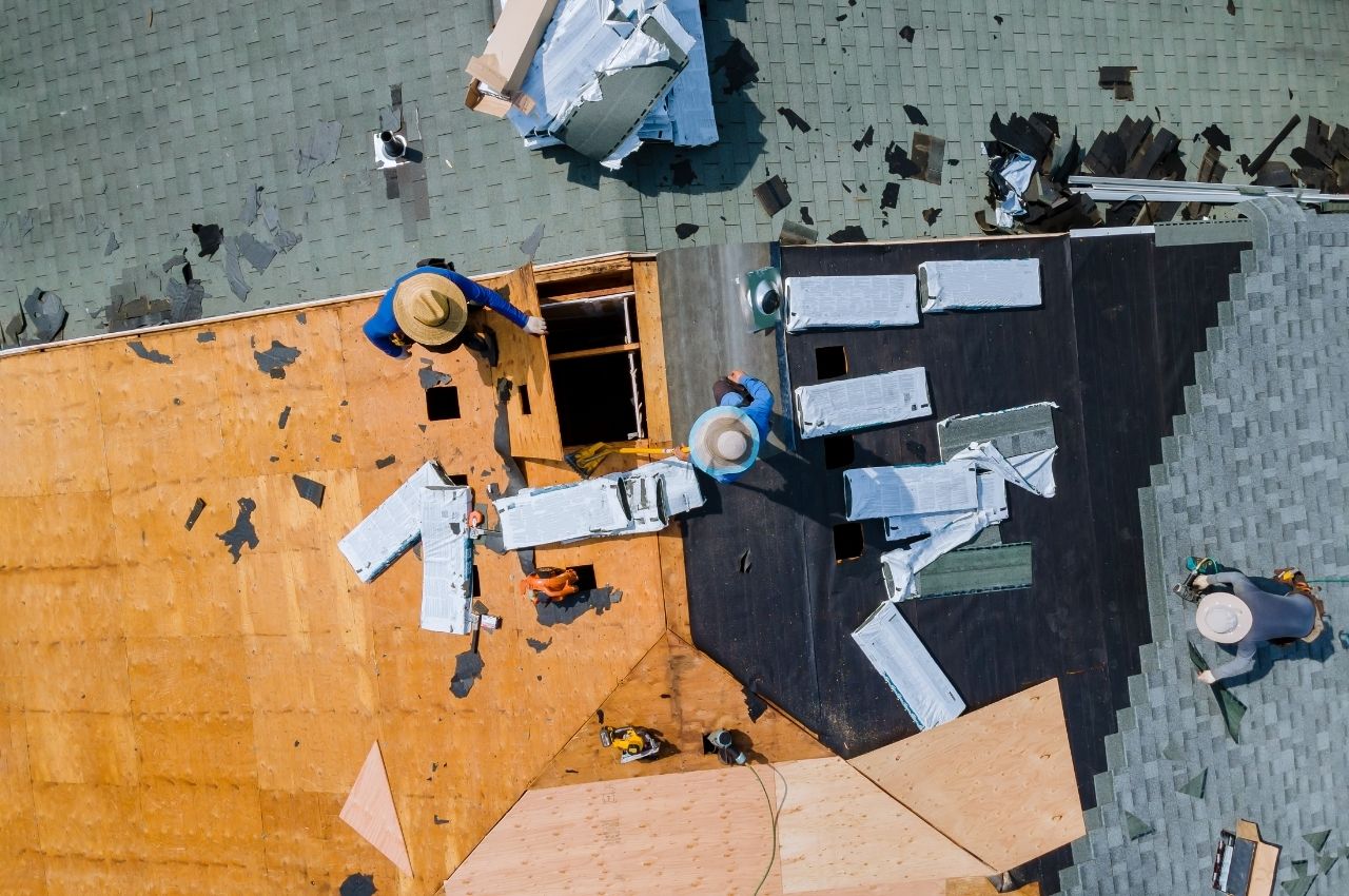 Roofer Working on Big Roof Replacement