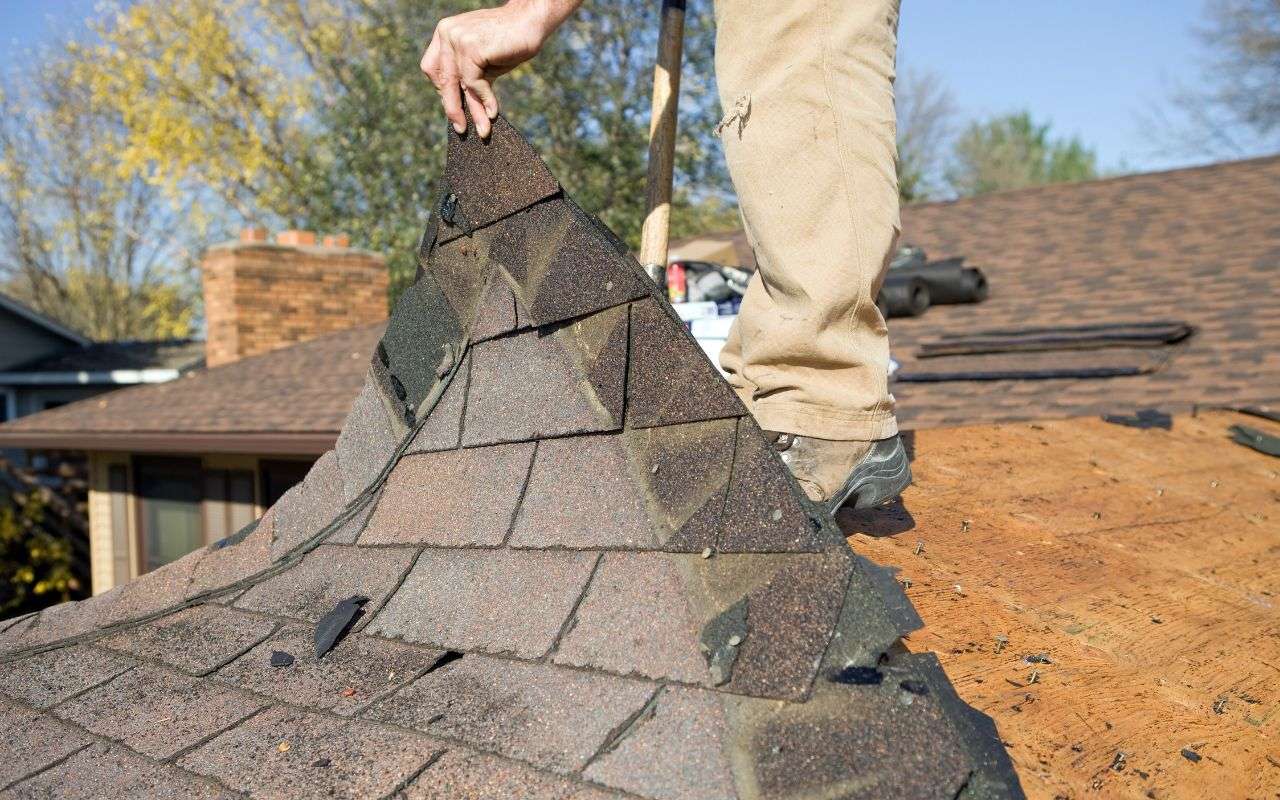 tearing old roof